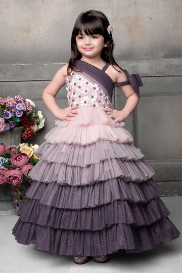 Designer Layered Ombre Gown for Girls – Pink to Purple Ruffle Tulle Dress with Floral Bodice & One-Shoulder Bow Detail