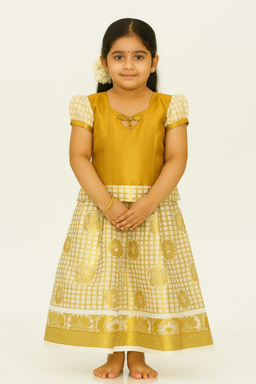 Traditional Golden Pattu Pavadai Set for Girls – Silk Blend Ethnic Wear with Checked Puff Sleeves & Floral Skirt Border – South Indian Festive Outfit