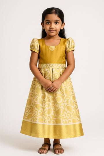 Golden Floral Pattu Pavadai Set for Girls – Puff Sleeve Silk Blend Dress with Brocade Skirt and Diamond Motif Neck