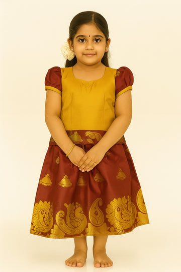 Mustard and Maroon South Indian Pattu Pavadai for Girls – Puff Sleeve Blouse with Temple Bell Motif Skirt and Zari Peacock Border