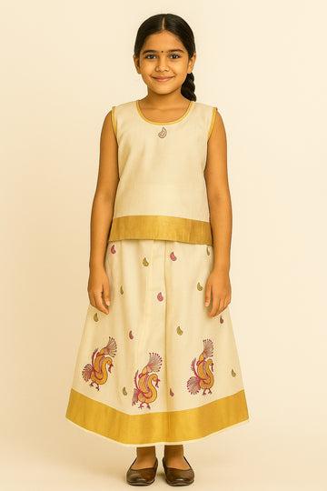 Elegant Off-White Pattu Frock for Girls – Sleeveless Gold-Bordered Top with Paisley Motifs & Multicolor Peacock Embroidered Skirt