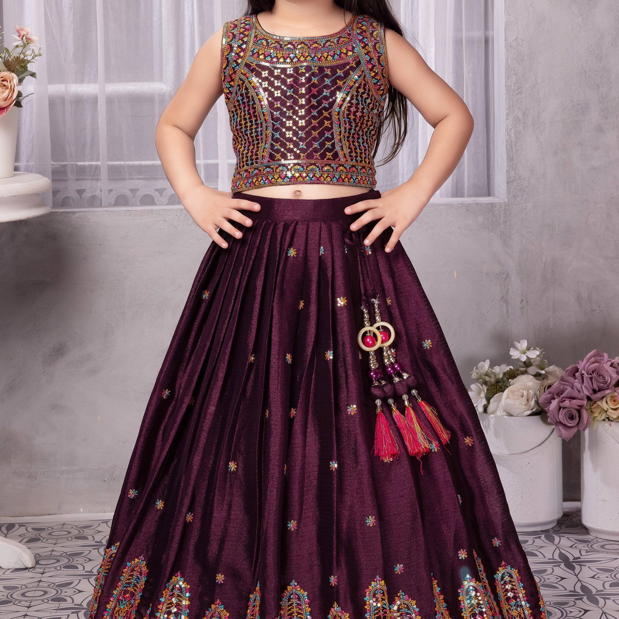 Wine Mirror Embroidered Lehenga Choli for Girls – Designer Partywear Outfit with Tassel Detail
