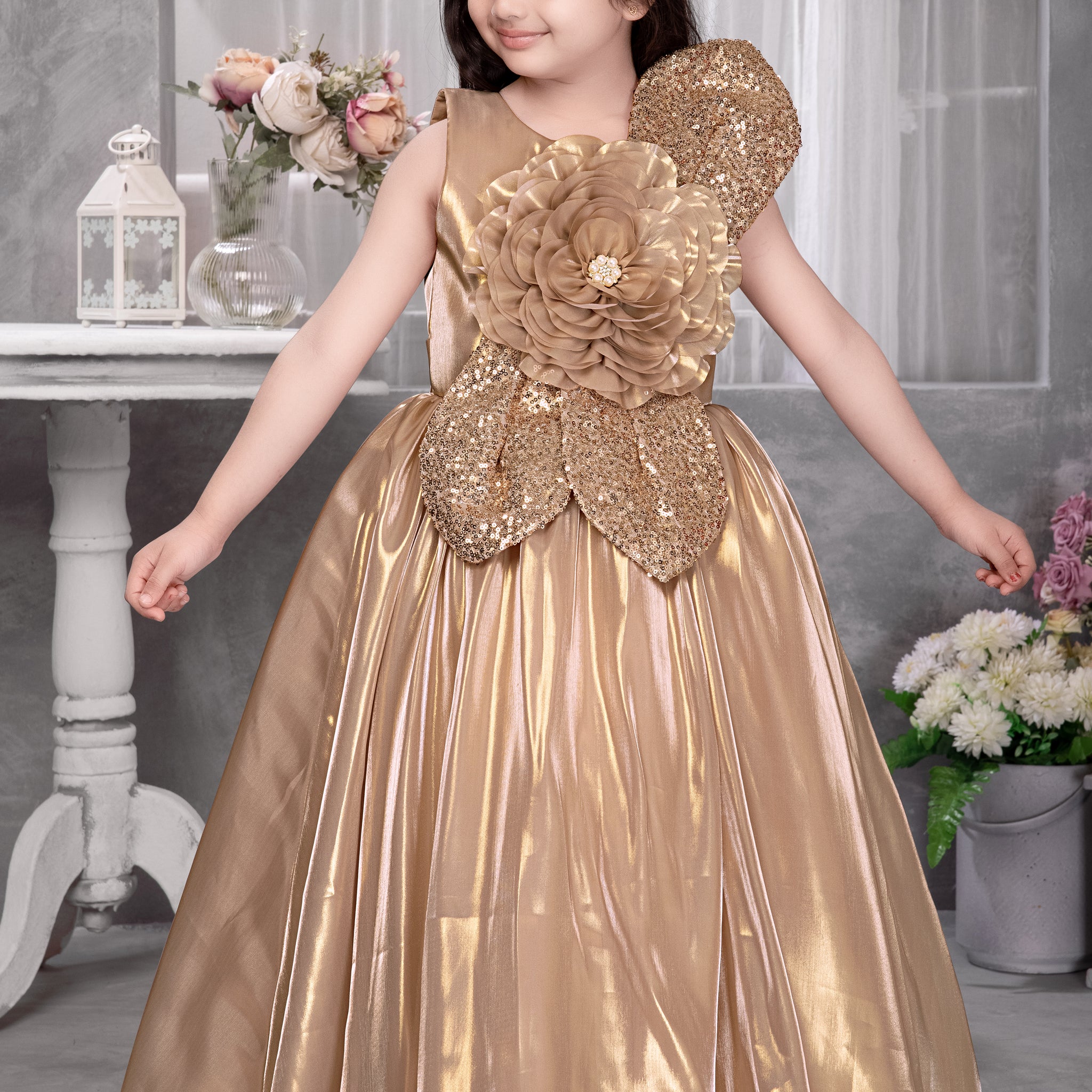 Golden Glamour Gown with Oversized Flower & Sequin Detailing – Premium Partywear for Girls