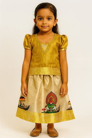 Golden Kerala Pattu Pavadai for Girls – Puff Sleeve Blouse with Traditional Kathakali and Snake Boat Print Skirt