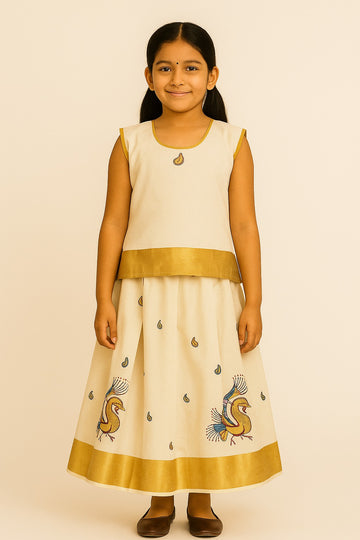 Elegant Off-White Traditional Pattu Frock for Girls – Sleeveless Ethnic Dress with Gold Zari Border & Peacock Motif