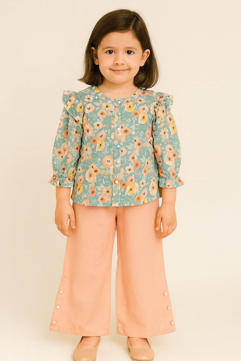 Mint Green All-Over Floral Cotton Shirt with Ruffle Sleeves & Peach Buttoned Palazzo Pants – Spring-Inspired Co-Ord Set for Girls