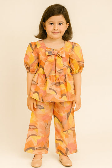 Sunset Orange Abstract Print Peplum Top with Bow & Matching Wide-Leg Pants – Breezy Co-Ord Set for Girls