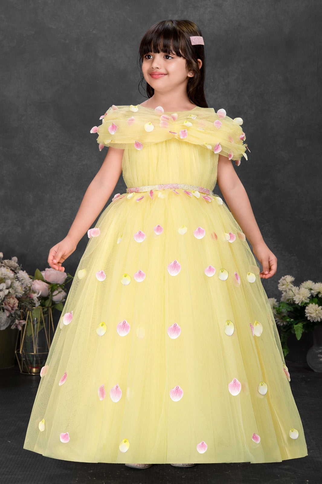 Yellow Net Party Gown with Pink Petal Embellishments – Girls’ Designer Dress