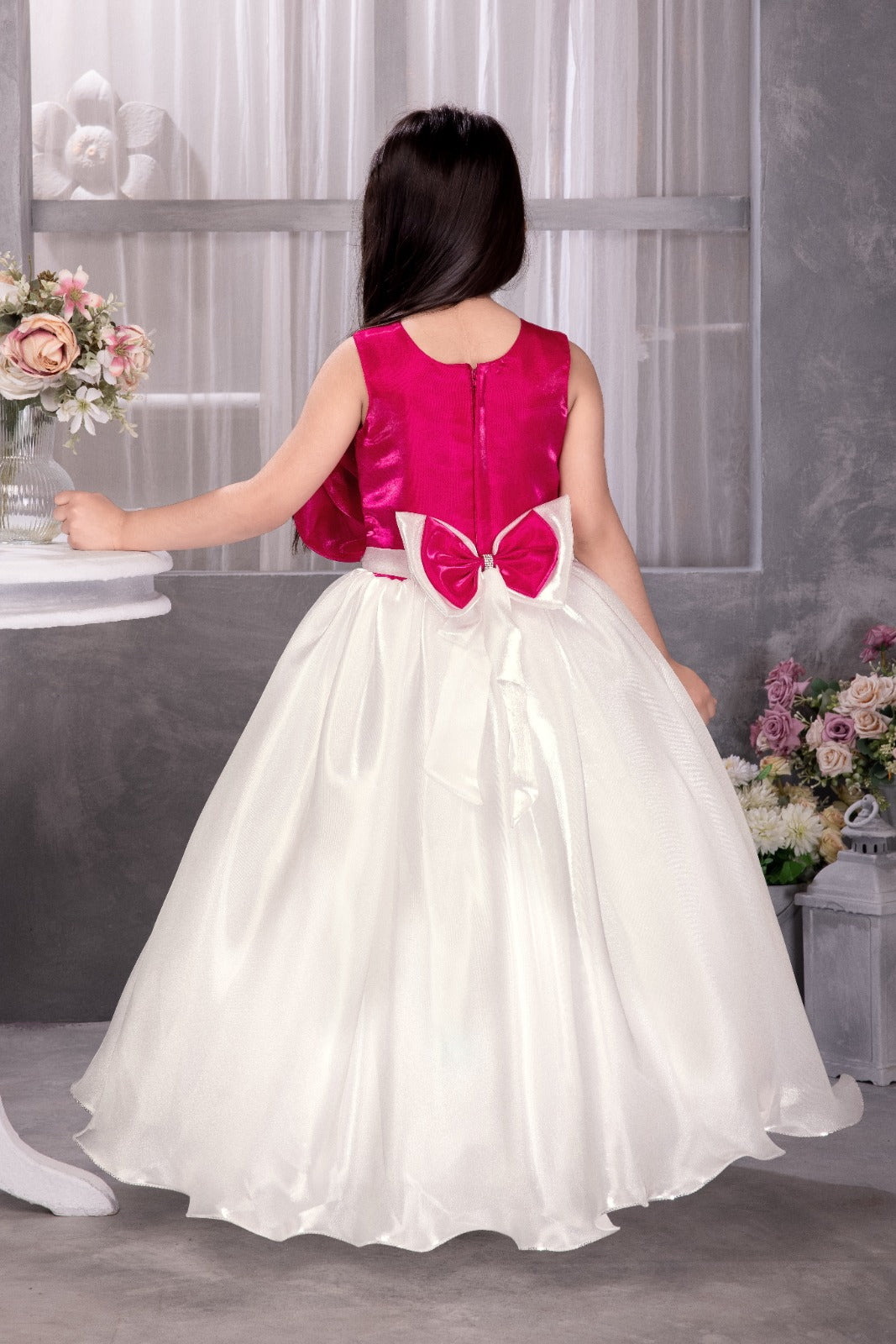 Magenta & White Full-Length Gown for Girls with Statement Bow Design – Elegant Sleeveless Party Dress